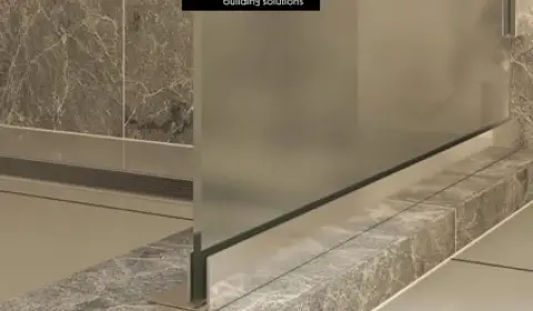 ichem: Integrated Solutions for Ceramic Profiles and Accessories A metal profile from ichem used as a professional finishing solution for ceramics in bathrooms