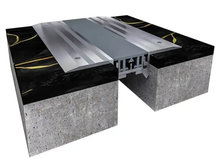 ichem: Durable Solutions for Floor Expansion Joint Covers A red car parked over an ichem floor expansion joint cover, demonstrating its durability in parking garages